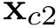 $\mathbf{x}_{c2}$